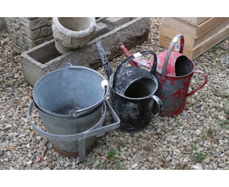 Two vintage galvanised watering cans and 2 metal buckets 