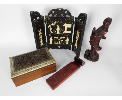 A collection of Asian carved wood items to include figure of Guanyin (30 cm height), folding table screen, trinket box and si