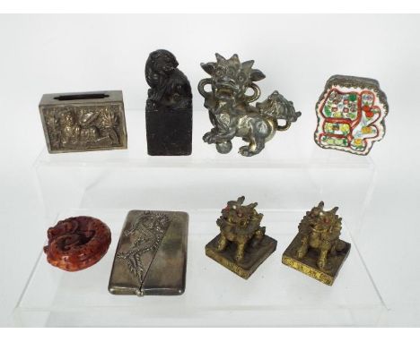 Lot to include a white metal matchbox cover, black soapstone Buddhist lion on plinth, trinket box and similar.