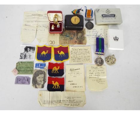 Lot to include a World War One (WW1 / WWI) medal pair comprising British War Medal and Victory Medal named to 860715 PTE F BE