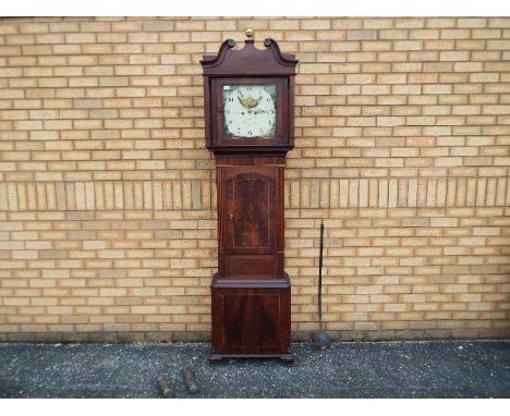 An early 19th century 8-day mahogany cased longcase clock, the case with ¾ length door, square reeded columns, swan-necked pe