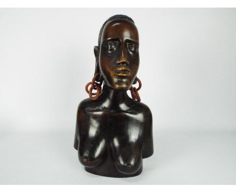 Ethnographica - A large, carved hardwood tribal bust, approximately 43 cm (h).