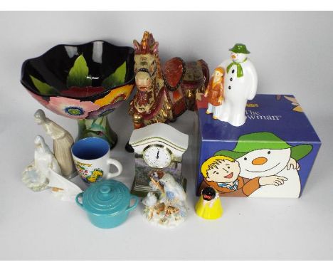 Mixed ceramics to include a large Blue Sky Pottery bowl, Nao figurine, Danbury Mint ceramic cased clock, Coalport Snowman mon