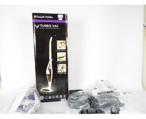 Russell Hobbs - A boxed Turbo Vac 2 in 1 Cordless Cleaner. Includes removable hand-held cleaner and brush tools.