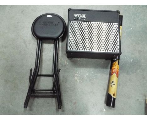 A Vox Valvetronix amplifier, model AD30VT, a Kinsman guitar stool and a didgeridoo. [3]