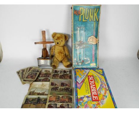 An early 20th century Underwood &amp; Underwood stereoscope viewer with a quantity of cards, vintage Kerplunk game and Junior