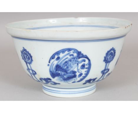A 19TH CENTURY CHINESE KANGXI STYLE BLUE & WHITE PORCELAIN BOWL, the sides painted with repeated phoenix medallions, the base