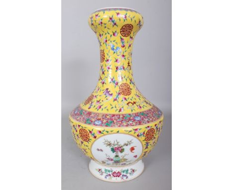 A LARGE CHINESE FAMILLE ROSE YELLOW GROUND PORCELAIN VASE, decorated with circular panels reserved on a ground of bats, peach