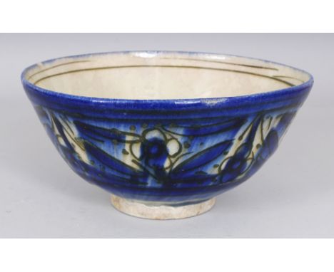 A 19TH CENTURY PERSIAN QAJAR GLAZED CERAMIC BOWL, 8.3in diameter & 4.1in high.