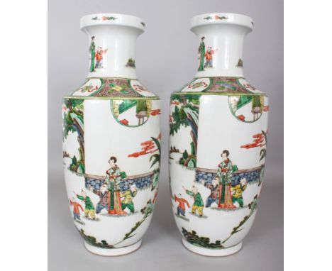 A LARGE PAIR OF CHINESE FAMILLE VERTE PORCELAIN ROULEAU VASES, each base with a six-character Kangxi mark, 17.25in high.