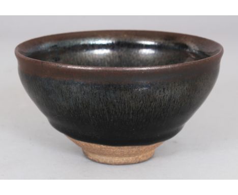 A CHINESE SONG STYLE JIAN WARE HARE’S FUR GLAZED CERAMIC BOWL, the glaze falling short of the foot, 4.6in diameter & 2.4in hi
