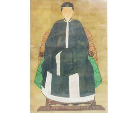 A LARGE 19TH CENTURY CHINESE FRAMED ANCESTOR PORTRAIT ON SILK, painted with a lady seated on a ruyi and lotus decorated thron