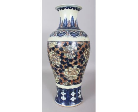 A LARGE 19TH CENTURY CHINESE COPPER-RED & UNDERGLAZE-BLUE BALUSTER PORCELAIN VASE, 18in high.