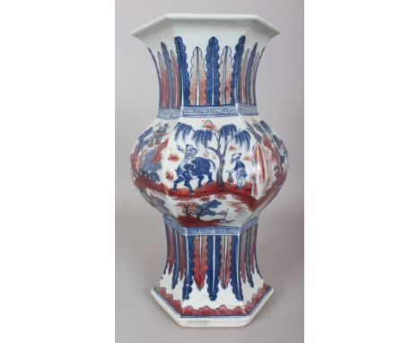 A CHINESE COPPER-RED & UNDERGLAZE-BLUE HEXAGONAL SECTION PORCELAIN VASE, 14.5in high.