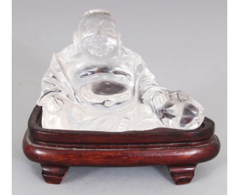 AN EARLY/MID 20TH CENTURY CHINESE ROCK CRYSTAL TYPE MODEL OF BUDAI, possibly glass rather than stone, together with a fitted 