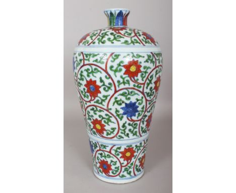 A CHINESE WUCAI MEIPING PORCELAIN VASE, decorated with formal scrolling lotus, the base with a six-character Jiajing mark, 14