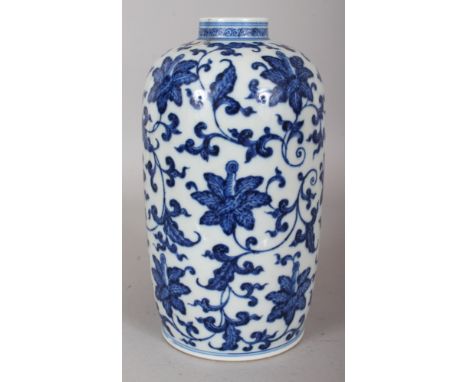 A CHINESE MING STYLE BLUE & WHITE PORCELAIN VASE, decorated with formal scrolling foliage, the base with a six-character Yong