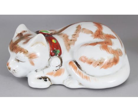 A 20TH CENTURY JAPANESE KUTANI PORCELAIN MODEL OF A SLEEPING CAT, the base unglazed, 7in long & 3.1in high.