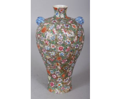 A GOOD QUALITY LATE 19TH CENTURY CHINESE MILLEFLEUR PORCELAIN VASE, the base with a Qianlong seal mark, 7in high.