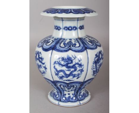 A CHINESE MING STYLE BLUE & WHITE PORCELAIN VASE, the lobed sides decorated with dragon roundels between formal borders, the 