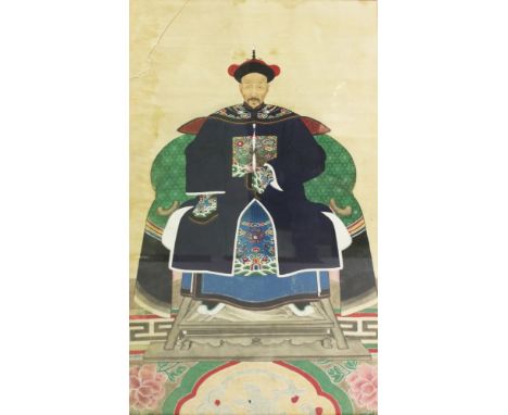 A 19TH CENTURY CHINESE FRAMED ANCESTOR PORTRAIT ON SILK, the seated Mandarin wearing a 5th Grade Military Rank Badge, the fra