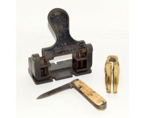 Vintage hole punch, nutcracker and a penknife