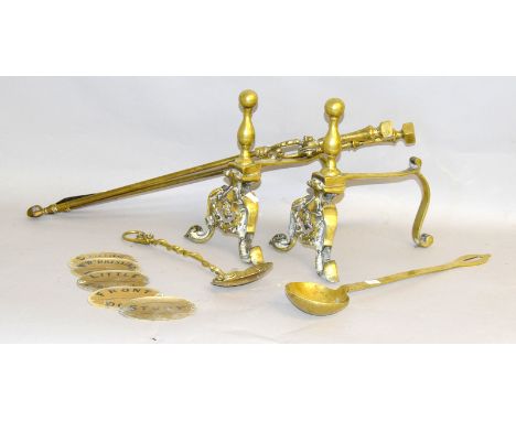 Brass fire dogs, poker, ladle, tongs and door sign