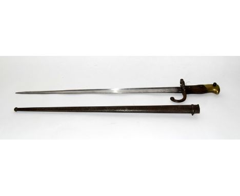 A late 19th century French model 1874 Gras bayonet in its steel scabbard. Made at the St Etienne arms factory in 1879. Blade 