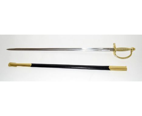 A single edged sword with gilt hilt and knuckle guard in its scabbard with brass mounts. Blade length 80cms