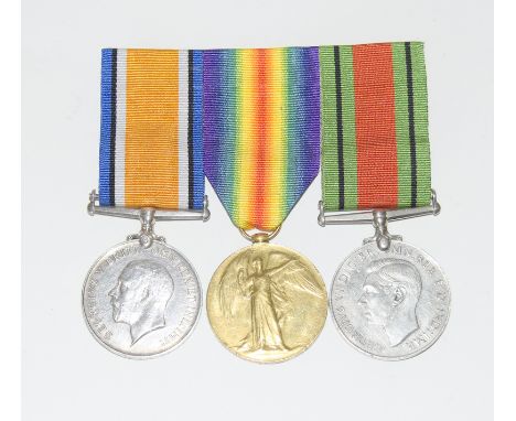 A mounted WW1 medal pair named to 2070 Private R Burt of the Dorset Regiment and his unnamed WW2 Defence Medal