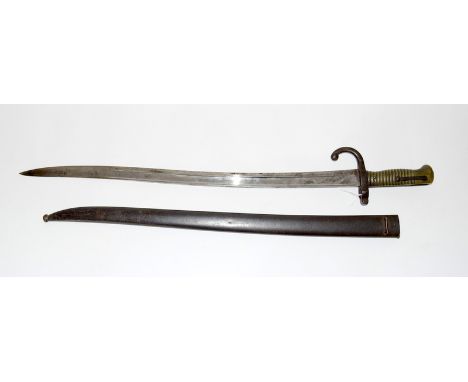 A French M1866 Chassepot bayonet in its steel scabbard. Made at the Tulle arms factory in 1874. Blade length 57.5cms