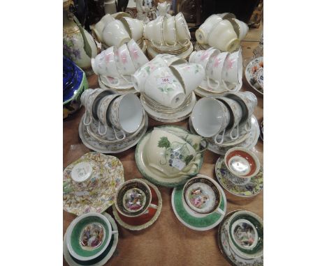 A selection of tea cups and saucers including Shelley