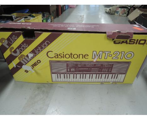 A vintage Casio keyboard, Casiotone MT-210 with original box