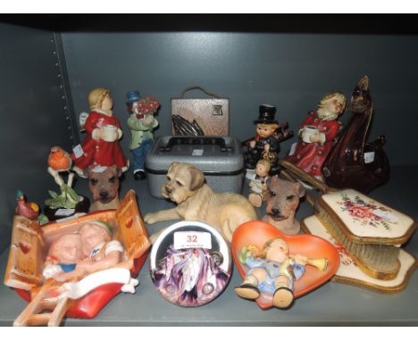 A selection of figures and figurines including Goebel