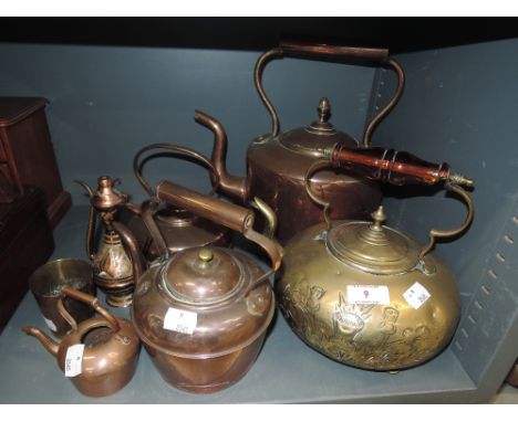 A selection of stove kettles with various designs including hand worked Scotch thistle designCONDTION REPORT - NOT SURE WHAT 