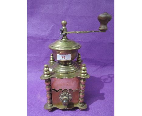 A 20th century brass coffee grinder of period style