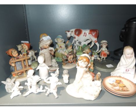 A selection of figures and figurines including Royal Doulton and Goebel 