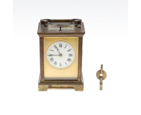 with white enamel dial and two train push button repeating mechanism striking half hourly to a gong, height excluding handle,