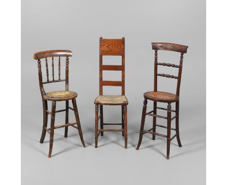 with ladder back and woven straw seat on turned legs, height 101cm, width 31cm, depth 25cm; together with two further correct