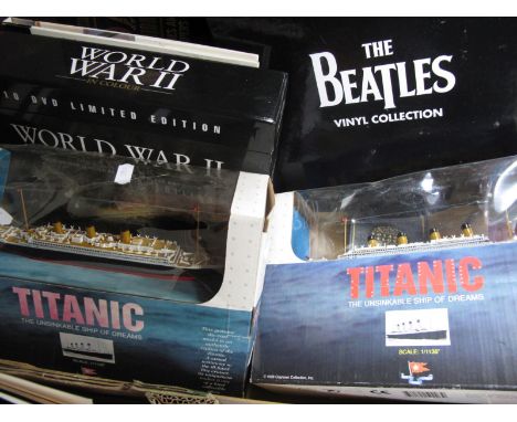 Two Die Cast Models of The Titanic, scale 1/1136 WWII 10 dvds in limited edition. The Beatles vinyl collection published fort