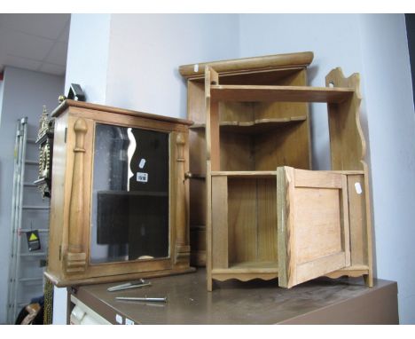 A Pine Corner Wall Shelf, 66cm high, two pine wall cupboards. (3)