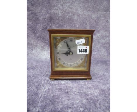 An Elliott Mantel Clock, with mahogany case, silver dial, Roman numerals with Retail name on dial, Garrard Co Ltd, 112 Regent