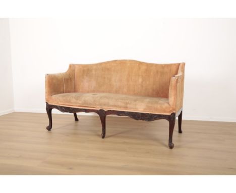 A LOUIS XV STYLE CAMEL BACK SOFA with cut velvet covers, with shell-carved and shaped apron on cabriole front legs to knurl t