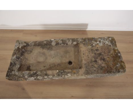 A STONE SALTING TROUGH 13cm high x 134cm wide x 52cm deep