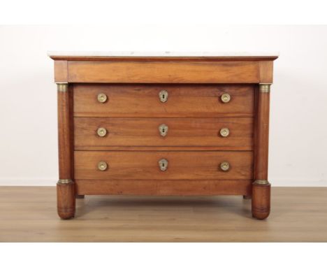 AN EMPIRE STYLE MAHOGANY AND MARBLE TOPPED COMMODE the single plain front frieze drawer over three further graduated drawers,