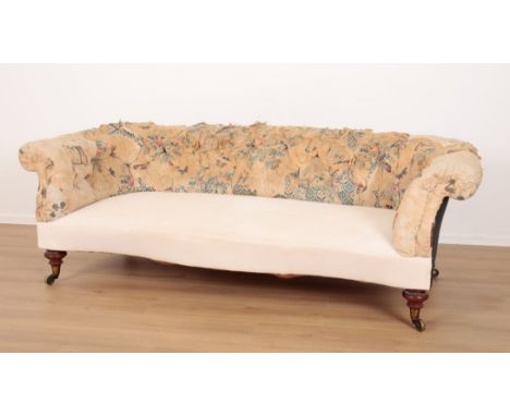 A HOWARD TYPE WALNUT SOFA stamped I60035974 to the rear left leg, the buttoned back over a serpentine seat, partially recover