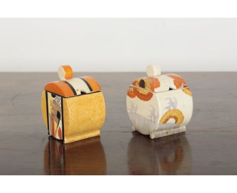 TWO CLARICE CLIFF BIZARRE BONJOUR PRESERVE POTS AND COVERS including an example decorated in the rhodanthe pattern, both 10.5