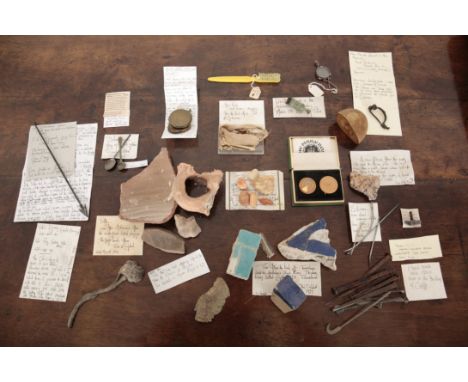 A COLLECTION OF CURIOSITIES including a Roman iron fibula, 6cm wide, a Chinese crossbow arrow, 26cm long, and an early 20th c