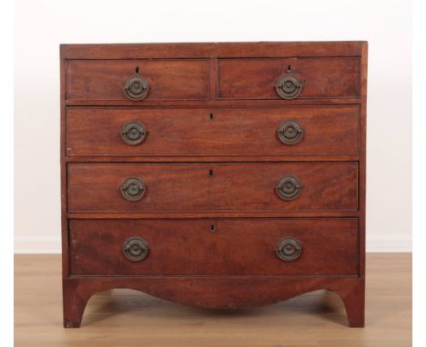A REGENCY MAHOGANY CHEST OF DRAWERS the cross-banded caddy top over two short and three long graduated drawers, shaped apron 