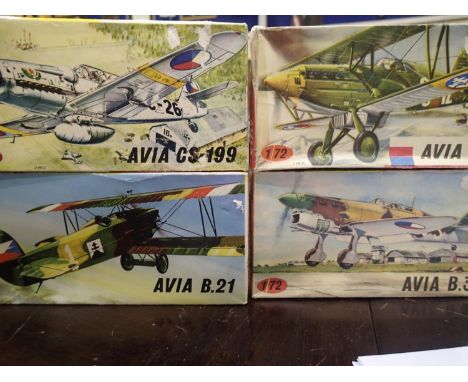 Four 1/72 scale K.P kits aircraft, Avia B21, Avia B534, Avia B35, and Avia CS199, all appear complete, boxes with wear. UK P&